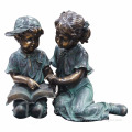 Metal garden sculpture grande bronze life size reading boy and girl garden statues for sale
